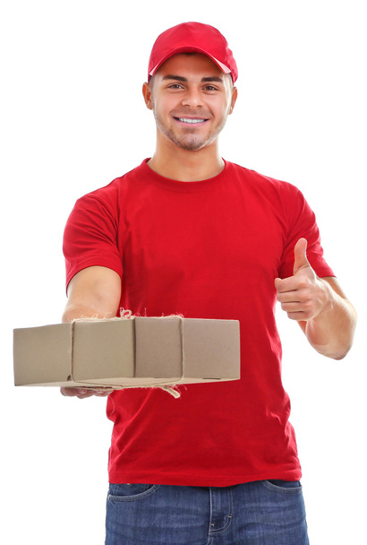 Delivery man holding package - Valokuva, kuva