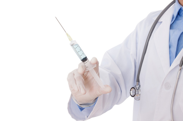 doctor holding syringe in hands - Фото, изображение
