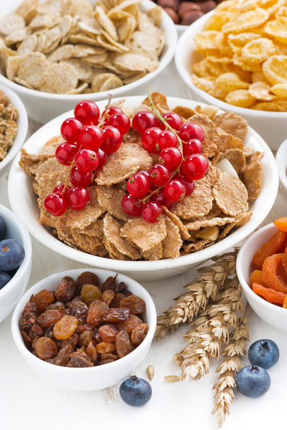 assortment of different breakfast cereal, dried fruit - Фото, изображение