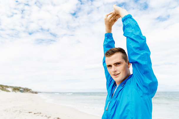 Muž na pláži mimo školení - Fotografie, Obrázek