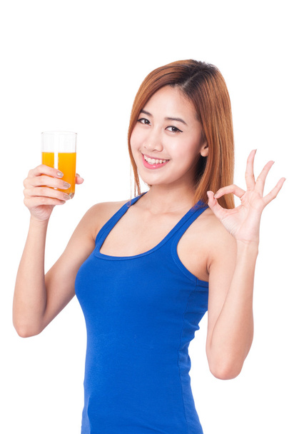 woman holding glass of orange juice - Fotó, kép