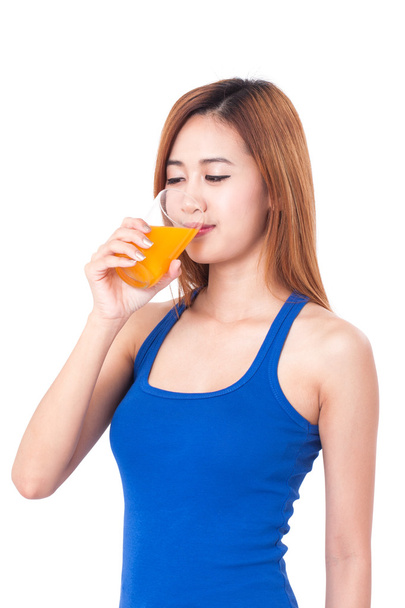woman drinking orange juice - Fotó, kép