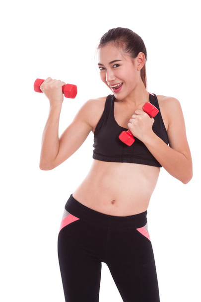 Sport woman exercising with dumbbells - Photo, Image