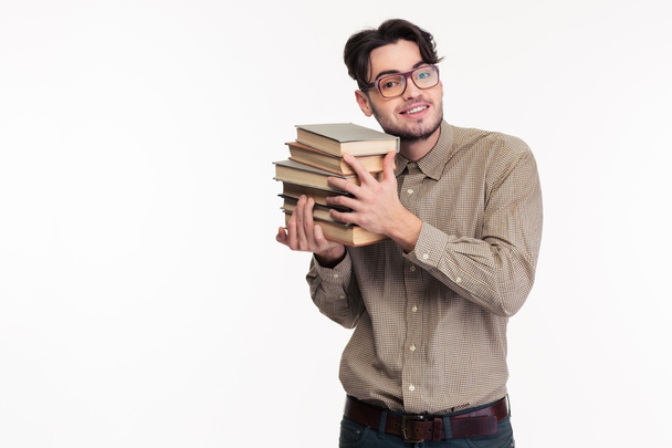 Happy casual man holding books - Valokuva, kuva
