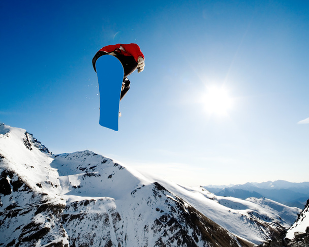 Acción de snowboard
 - Foto, Imagen