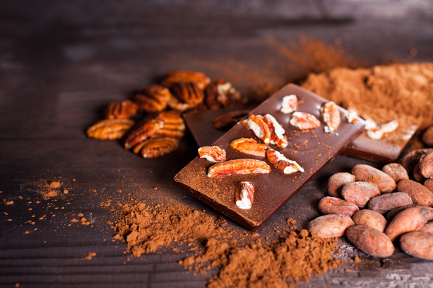 Chocolate products and nuts - Φωτογραφία, εικόνα