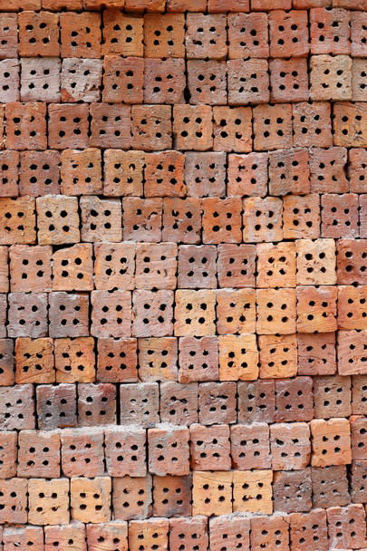 Pilha de tijolos de argila textura fundo
. - Foto, Imagem