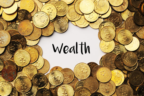Achtergrond van de munten van Maleisië met woord rijkdom in de midd - Foto, afbeelding