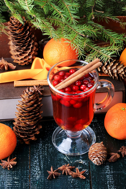 Christmas hot drink with cranberries and cinnamon fir mandarin oranges winter holiday - Fotoğraf, Görsel