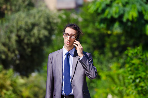 Young businessman at the street scene - 写真・画像