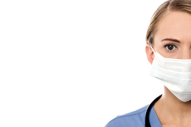 female surgeon with surgical mask - Foto, afbeelding