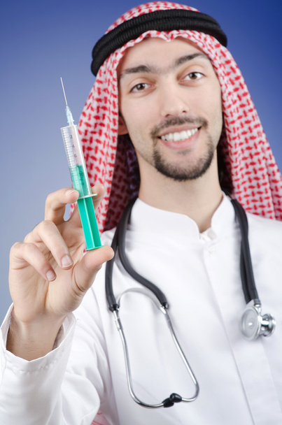 Arab doctor with syringe - Zdjęcie, obraz
