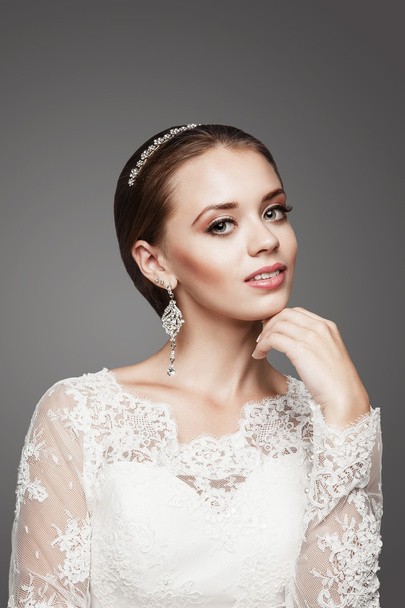 A beautiful girl is in a wedding decoration - Zdjęcie, obraz