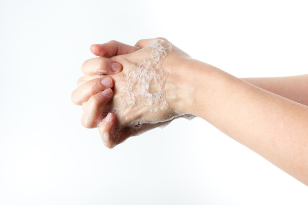 ele nainen pesee kätensä valkoisella taustalla
 - Valokuva, kuva