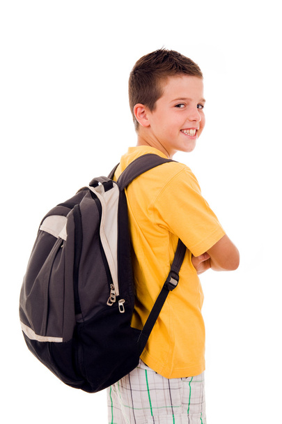Smiling school boy over white background - Foto, afbeelding