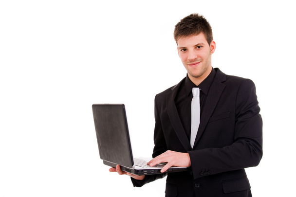 Young business man working with is laptop - Photo, image