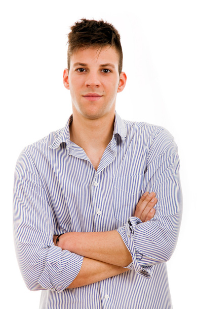 Portrait of a young casual man with arms crossed against white b - Foto, Imagem