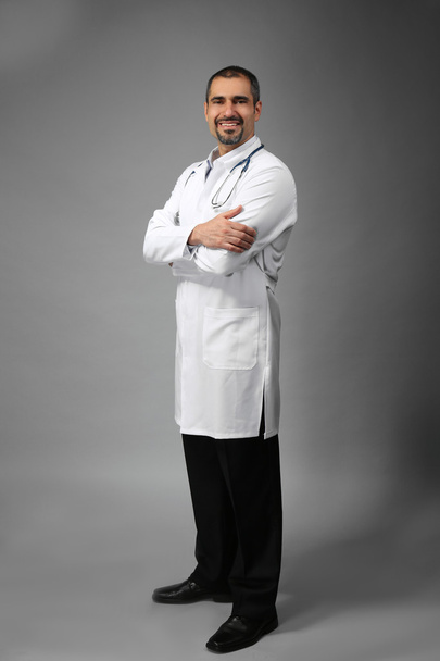 doctor on grey background - Fotografie, Obrázek