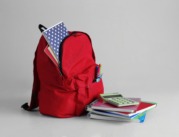 Backpack with school supplies - Foto, afbeelding