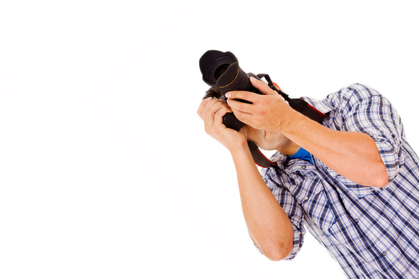 Photographer in action with camera - Zdjęcie, obraz
