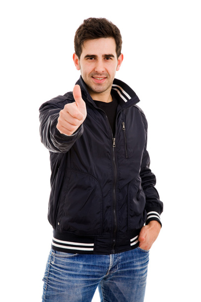 Happy young casual man showing thumb up - Zdjęcie, obraz