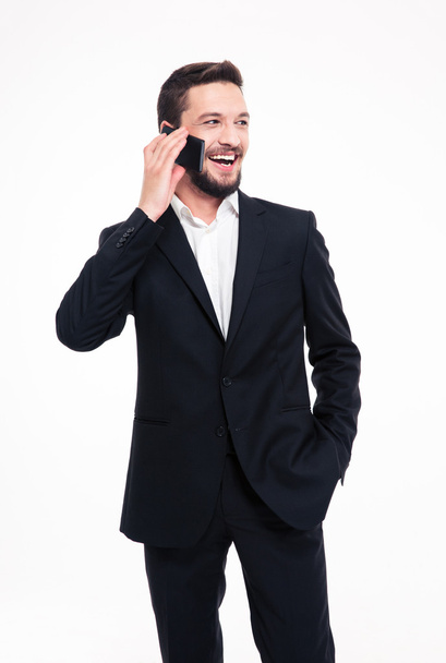 Cheerful businessman talking on the phone - Photo, Image