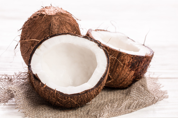 Coconut on wooden table.Vintage filter. Organic healthy food concept.Beauty and SPA concept. - 写真・画像