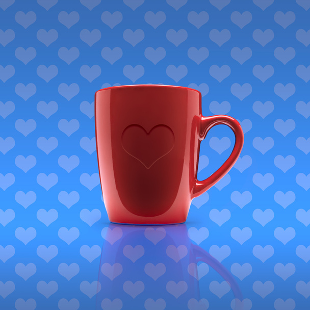 cup with heart on a blue background - Photo, Image