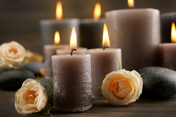 Flowers with lighted candles  - Valokuva, kuva