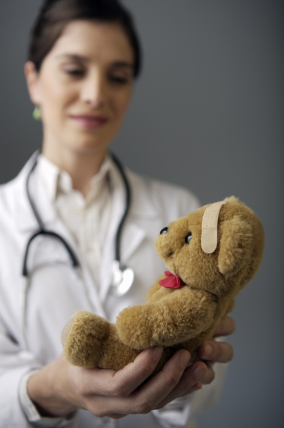 doctor holding teddy bear - Photo, Image