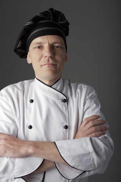 Chef aux bras croisés
 - Photo, image