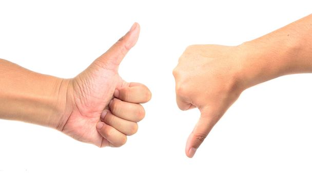 Thumb up and thumb down hand signs isolated on white with a copy space - Foto, immagini