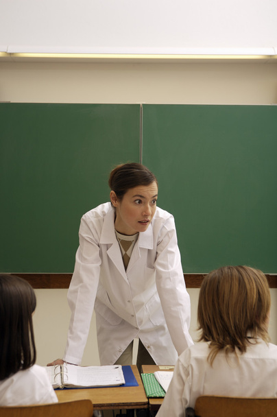 Vrouwelijke leraar geven les - Foto, afbeelding