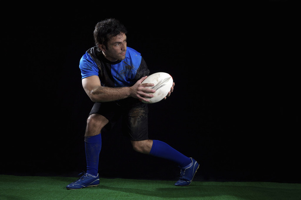 Joueur de rugby avec balle
 - Photo, image