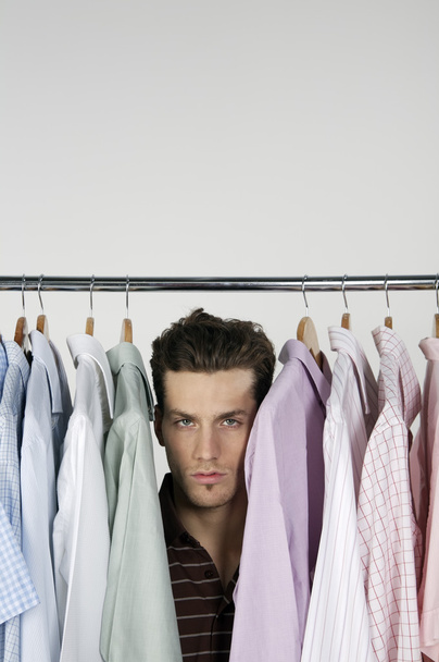 man in row of different shirts - Φωτογραφία, εικόνα