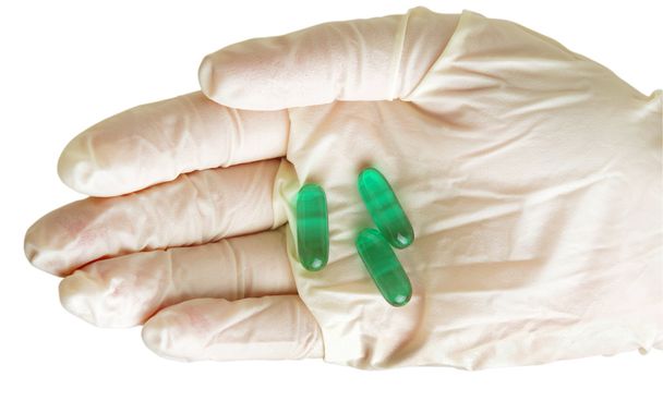 Рука в перчатках и таблетках
 - Фото, изображение