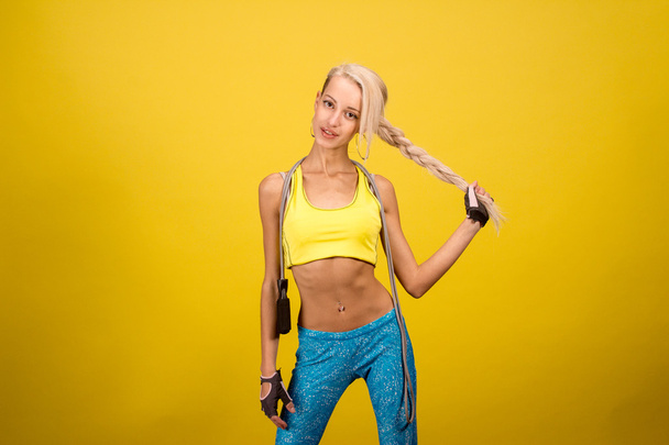 Portrait of young and healthy blonde with skipping rope - Foto, immagini