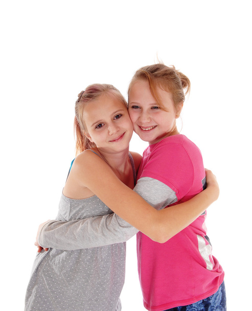 Smiling sisters hugging each other. - Foto, Imagem