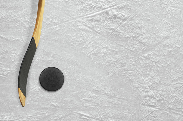 Hockey stick and puck on the ice - Zdjęcie, obraz