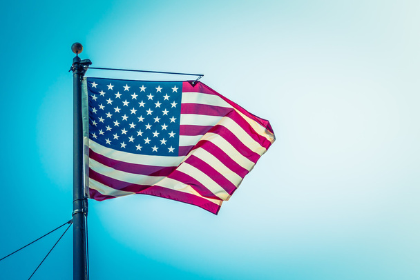 American flag on blue sky - Photo, Image