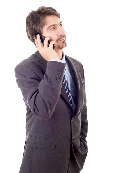 jonge zakenman aan de telefoon, geïsoleerd - Foto, afbeelding