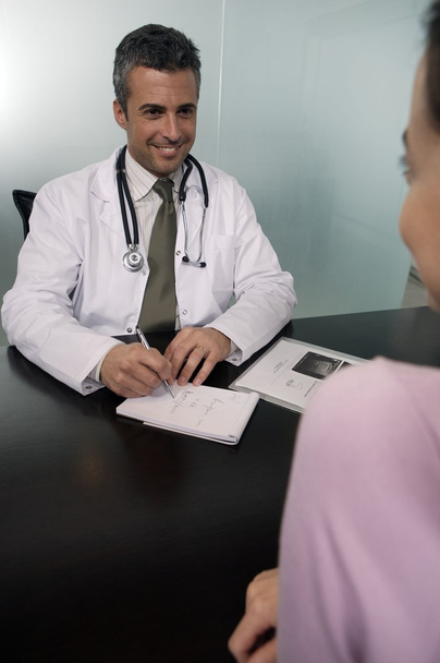 Doctor working with patient  - Photo, Image