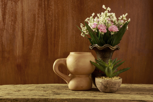 Flowers and Earthenware in Still life Style - Foto, afbeelding