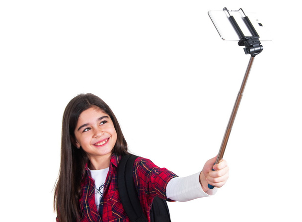 mooie school meisje doen selfie - Foto, afbeelding