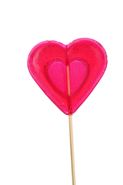 Red heart-lollipop isolated on white - Foto, Bild