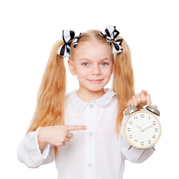 Little student indicating that time is running out. - Foto, Bild