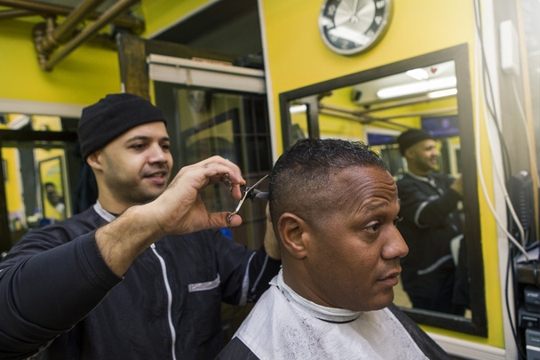 Barber Giving his Client a Haircut, In Barber Shop. - Photo, Image