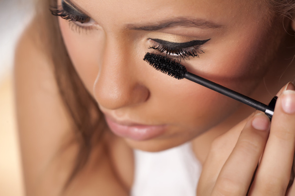 girl applying mascara - Photo, Image