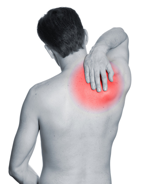 Visão traseira de um jovem segurando seu pescoço com dor
 - Foto, Imagem