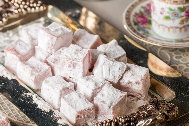 Cup of coffee with turkish delight  - Photo, Image